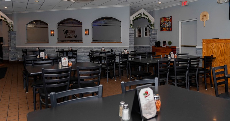 Interior, tables and chairs ready for guests