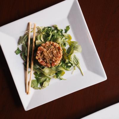 Tuna Tartare on a bed of arugula.