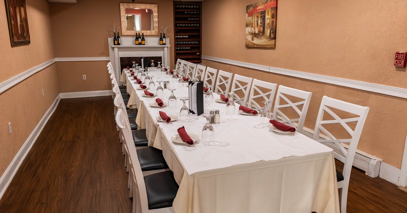 Interior, long table ready for guests