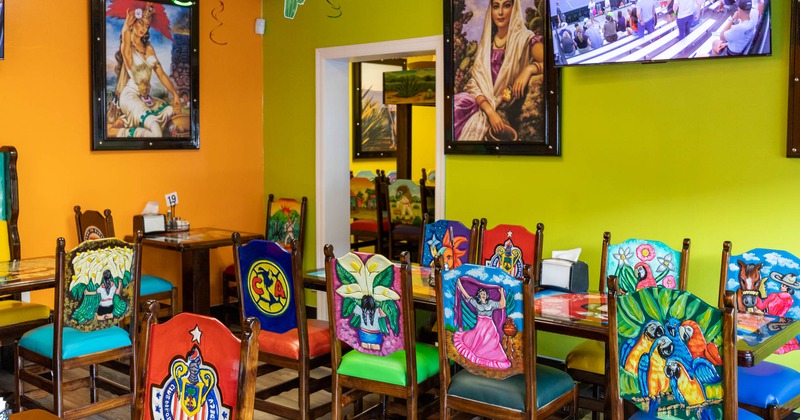 Interior, colorful tables and chairs