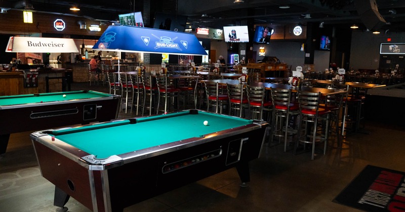 Interior, seating area around pool tables