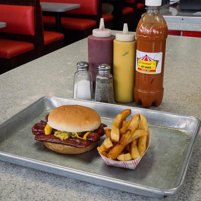 Double meat Hotdog Split Roll  served with fries on the side.