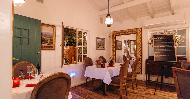 Interior, dining area, guest tables with tableware