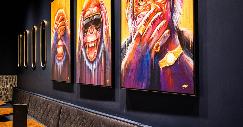 Interior, guest tables and seats, wall art