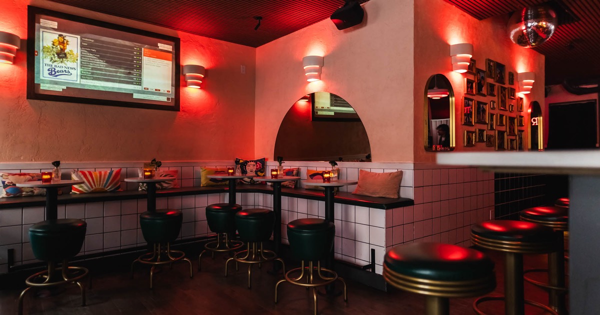 Seating corner with tables and bar stools