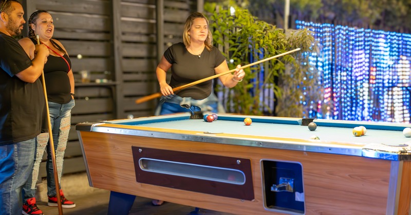 Billiard table, guest in player pose