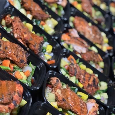 Catering grilled meat salad plates.
