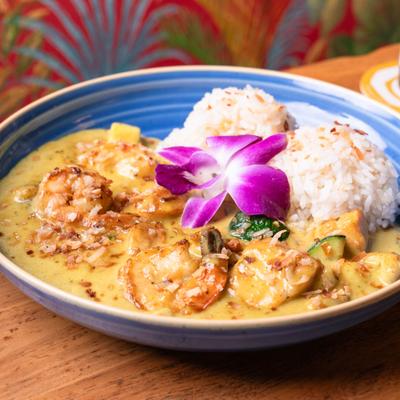 Seafood with Thai green curry and rice.