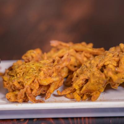 Onion, spinach, and cabbage cooked with Himalayan spices and herbs.