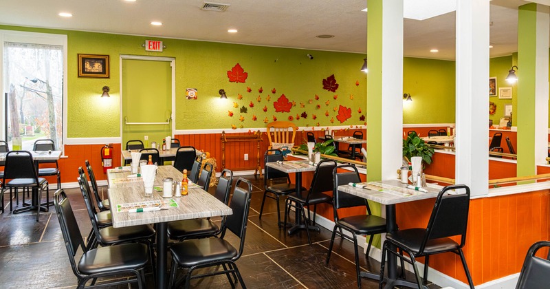 Interior, seating area with tables and chairs