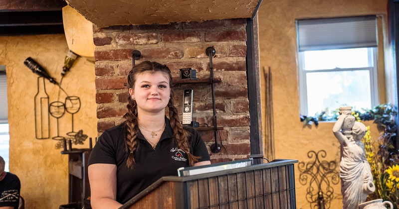 Employee at the greeting desk