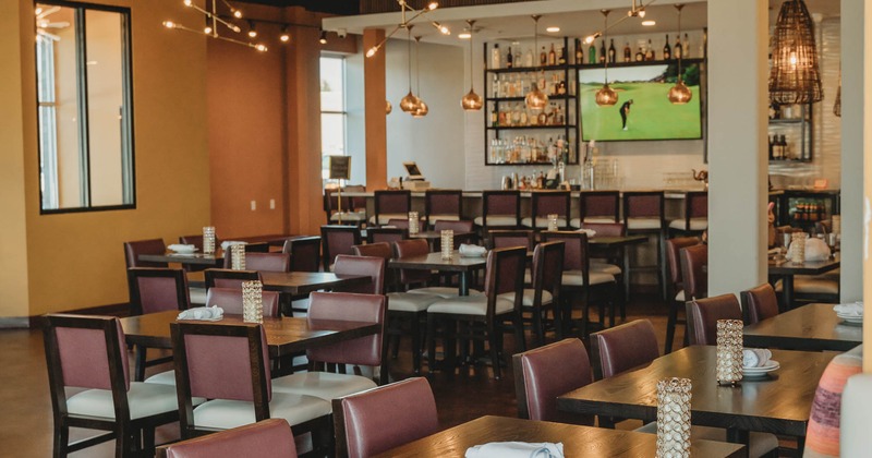 Interior of a modern restaurant with wooden tables