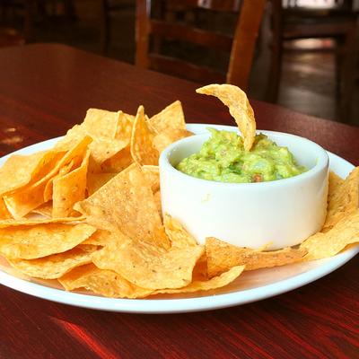 Guacamole and tortilla chips.