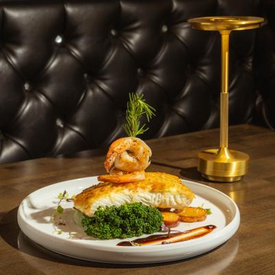 Filet of halibut with potato crust and colossal shrimp.