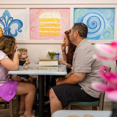 Custoemrs having cake.