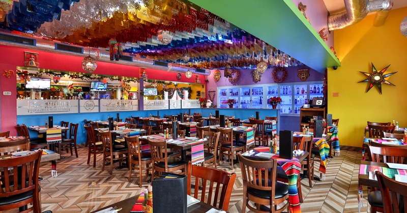 Interior, wide view, dining tables with tableware