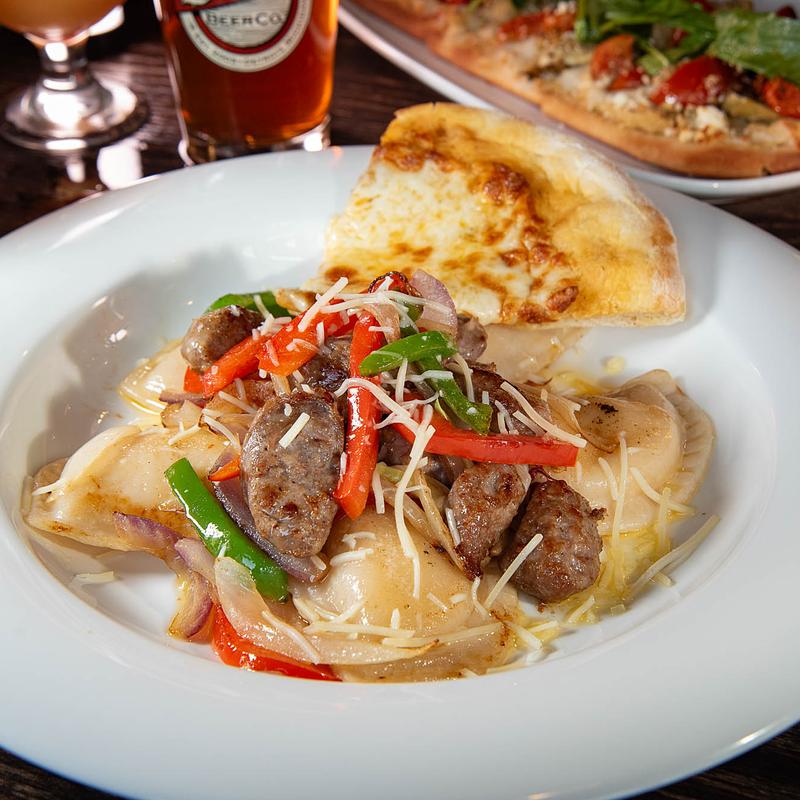 Potato and Cheese Pierogi with Italian Sausage photo