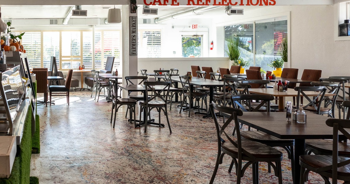Interior, seating area with empty tables and chairs