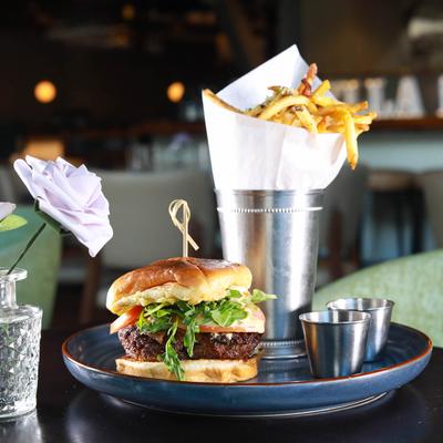 Angus beef burger served with truffle fries.