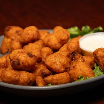 Buffalo Cauliflower served with celery and house made ranch.