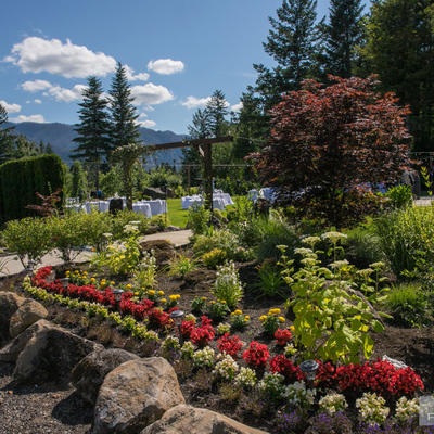 Fower garden with path to the main entrance in the back