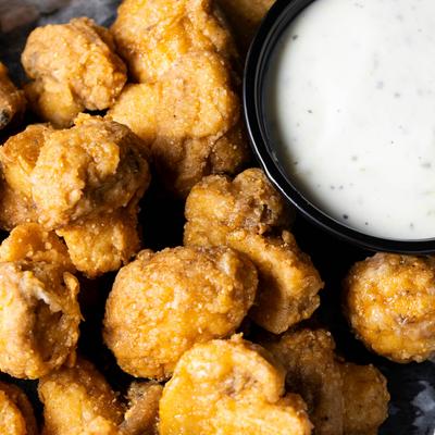 hand breaded button mushrooms served with your choice of a dipping sauce.