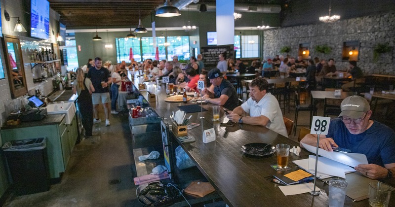 Interior space, bar area, guests enjoying their drinks