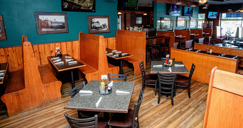 Interior, dining area with tables set for guests