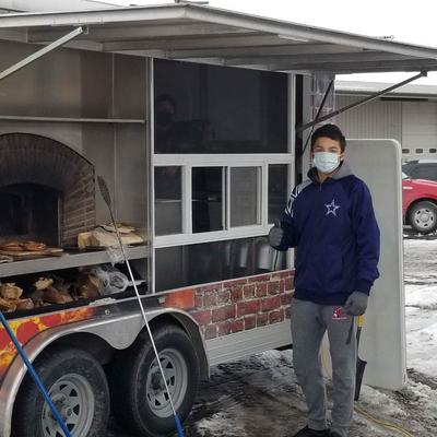 Customer by the trailer.