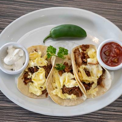 Pulled Pork Tacos with sauces on the side