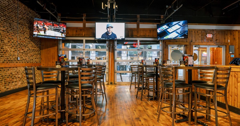 Seating area, tall tables and chairs