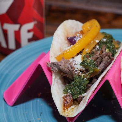 Carne Asada tacos with a can of lager.