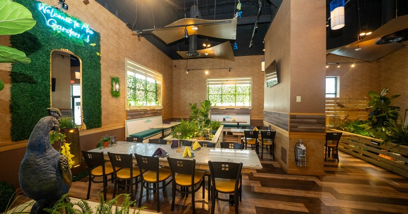 Dining area with lush greenery