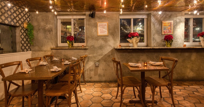 Restaurant interior, dining area with set dining tables