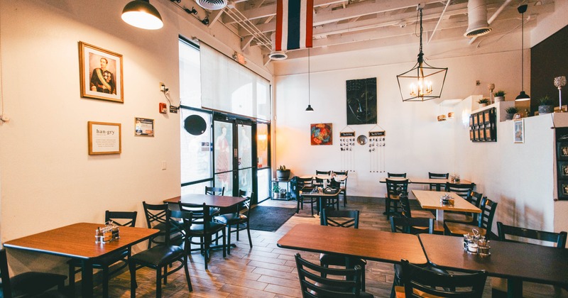 Interior with wooden tables and chairs