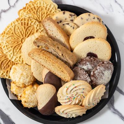 Plate of various cookies, top view.
