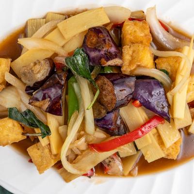 Tofu Eggplant with Basil, served with spicy chili sauce.