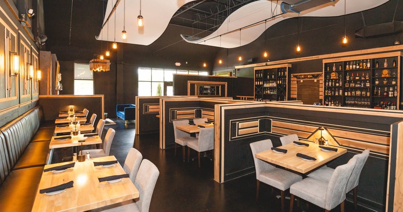 Interior, dining area with tables set for guests