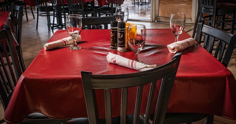 Interior, table set for guests