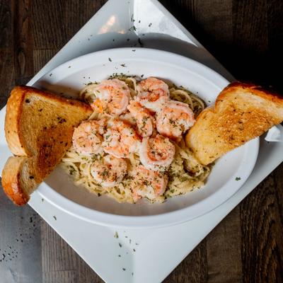 Shrimp linguine pasta with garlic toast.