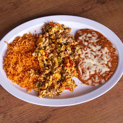 Mexican sausage with eggs served with rice and beans.