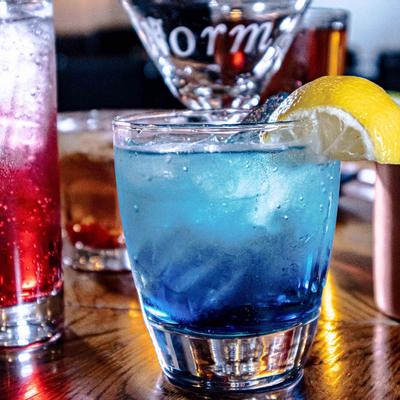 couple of cocktails, focus on the blue one