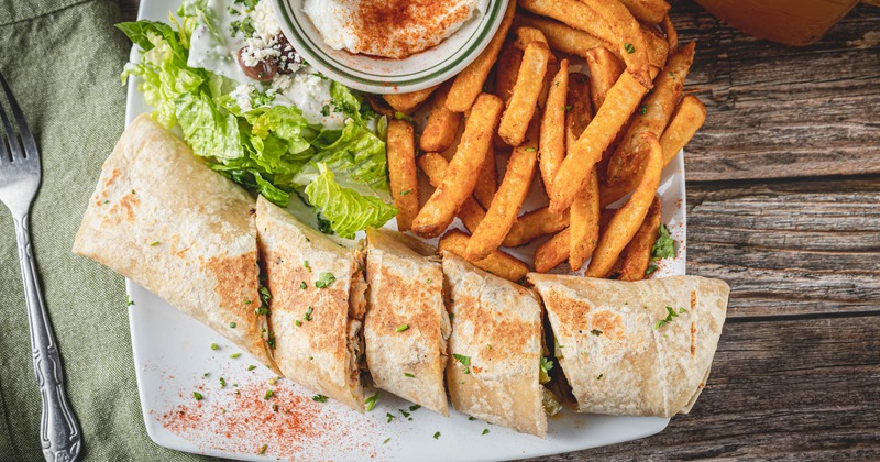 Pita wrap, with fries, and salad