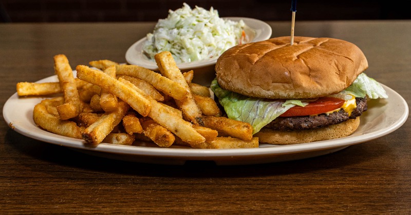 Cheeseburger with fries and coleslaw
