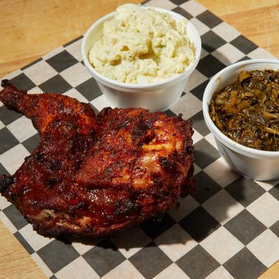 Smoked half chicken, collard greens, and potato salad.