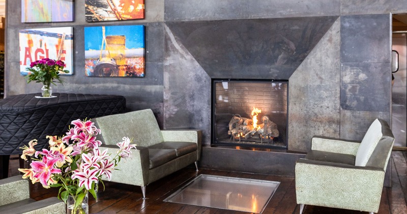 Interior, lounge seating by fireplace