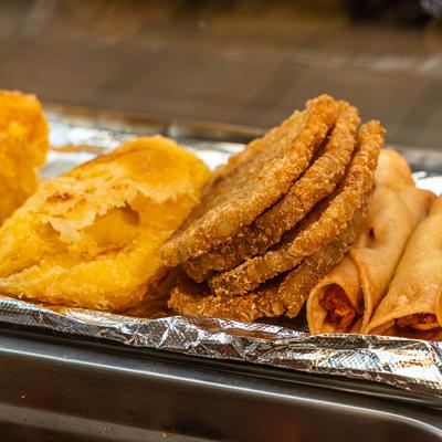 Assorted fried food on a plate.