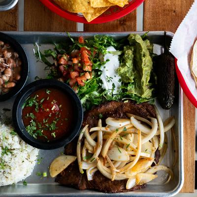 A top view of a served plate with various food.