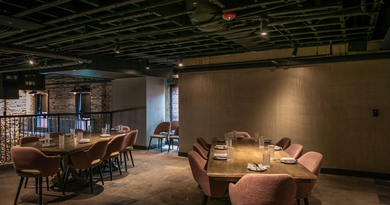 Dining area, tables for multiple people ready for guests