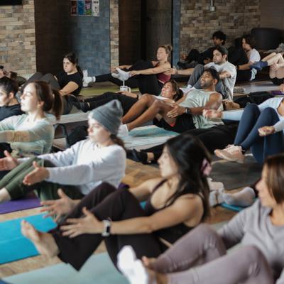 Group of people at yoga class.